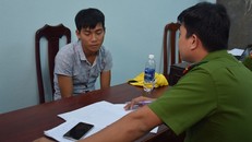 Nghi phạm Quang tại cơ quan điều tra. (Ảnh: N. Thắng)