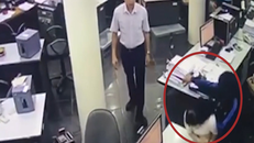 Camera ghi hình thanh niên cầm kiếm cướp ngân hàng