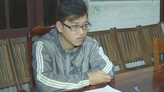 Đối tượng Đỗ Hữu Bảo tại cơ quan điều tra. - Ảnh: Zing.vn