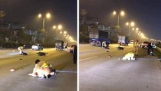 Hiện trường thượng uý CSGT bị xe máy tông trúng.