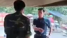 Phó Chủ tịch huyện phản ứng gay gắt khi được đo thân nhiệt: Có bị xử lý hình sự?