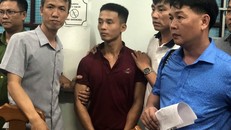 Đối tượng Triệu Quân Sự tại cơ quan công an thành phố Tam Kỳ. - Ảnh: TTXVN