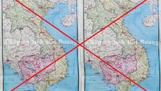 Công an Hải Dương tiêu hủy bản đồ in hình "đường lưỡi bò" phi pháp. - Ảnh: VietNamNet