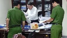 Bị can Đặng Văn Quang (áo trắng). - Ảnh: Zing.vn