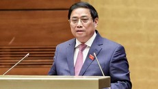 Thủ tướng Phạm Minh Chính trình bày Báo cáo kết quả thực hiện kế hoạch phát triển kinh tế-xã hội năm 2022; dự kiến kế hoạch phát triển kinh tế-xã hội năm 2023 - Ảnh: VGP