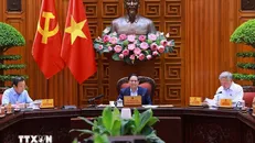 Thủ tướng Phạm Minh Chính chủ trì cuộc họp Thường trực Chính phủ về trung tâm tài chính quốc tế tại Thành phố Hồ Chí Minh và Đà Nẵng. Ảnh: Dương Giang/TTXVN