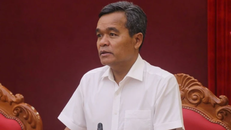 Ông Hồ Văn Niên phát biểu tại Hội nghị