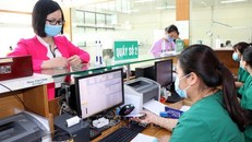 Sử dụng ứng dụng VssID cho khám chữa bệnh. Ảnh minh họa: TTXVN