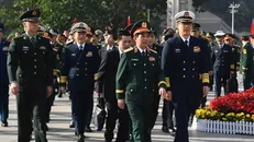 Đại tướng, Bộ trưởng Quốc phòng Phan Văn Giang và Thượng tướng Đổng Quân, Bộ trưởng Bộ Quốc phòng Trung Quốc. Ảnh: TTXVN 