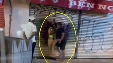 Hình ảnh chiến sĩ CSGT giằng co với ông C. lan truyền trên mạng xã hội (ảnh cắt từ clip). 