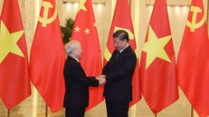 Tổng Bí thư Nguyễn Phú Trọng và Tổng Bí thư, Chủ tịch Trung Quốc Tập Cận Bình. Ảnh: Trí Dũng/TTXVN.