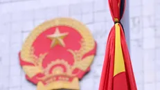 Treo cờ rủ tưởng nhớ Tổng Bí thư Nguyễn Phú Trọng. Ảnh: Văn Điệp/TTXVN.