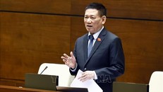 Phó Thủ tướng Chính phủ, Bộ trưởng Bộ Tài chính Hồ Đức Phớc giải trình, làm rõ một số vấn đề đại biểu Quốc hội nêu. Ảnh: Doãn Tấn/TTXVN.