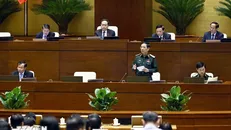 Bộ trưởng Bộ Quốc phòng Phan Văn Giang giải trình, làm rõ một số vấn đề đại biểu Quốc hội nêu. Ảnh: Doãn Tấn/TTXVN.