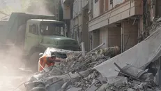 Tòa nhà bị phá hủy sau cuộc tấn công của Israel tại Tehran (Iran). Ảnh: THX/TTXVN