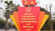 Cờ Đảng, cờ Tổ quốc và khẩu hiệu kêu gọi cử tri đi bầu cử đại biểu Quốc hội khóa XVI và đại biểu HĐND các cấp trang hoàng rực rỡ trên đường trục phía Nam thuộc xã Bình Minh. Ảnh: Tuấn Điệp.