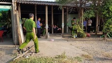 Công an khám nghiệm tại hiện trường vụ án. Ảnh Zing