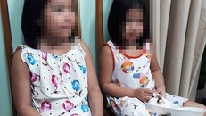 Hai cháu bé được công an Thành phố HCM giải cứu. Ảnh: Công Lý