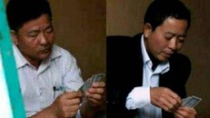 Hình ảnh ông Vũ Trọng Hải - Bí thư Đảng ủy, Chủ tịch HĐND (phải) và ông Trần Văn Phiệt - Phó Chủ tịch UBND xã Minh Châu đang đánh bạc.