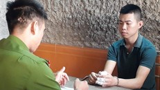 Giang tại cơ quan công an.