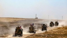 Quân đội Mỹ và Thổ Nhĩ Kỳ tuần tra chung tại Syria. (Nguồn: ahvalnews.com)