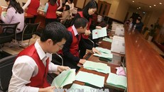 Một phiên bán đấu giá tại Sở Giao dịch Chứng khoán Hà Nội (HNX). Ảnh minh họa: Phạm Hậu/TTXVN