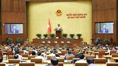 Bộ trưởng Bộ Xây dựng Trần Hồng Minh trình bày Tờ trình về chủ trương đầu tư xây dựng Cảng Hàng không quốc tế Gia Bình, sáng 14/11/2025. Ảnh: Doãn Tấn/TTXVN 