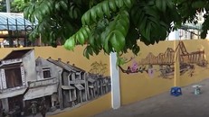 Hà Nội cổ kính đẹp mê mẩn qua 'phố bích họa' trên đường Phan Đình Phùng