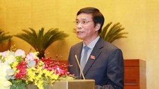 Chánh văn phòng Hội đồng bầu cử quốc gia Nguyễn Hạnh Phúc trình bày Báo cáo kết quả triển khai công tác bầu cử đại biểu Quốc hội khóa XV và đại biểu Hội đồng nhân dân các cấp nhiệm kỳ 2021-2026. (Ảnh: Phương Hoa/TTXVN)