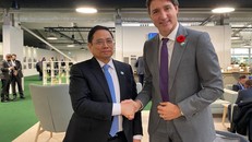 Thủ tướng Chính phủ Phạm Minh Chính và Thủ tướng Canada Justin Trudeau - Ảnh: TTXVN