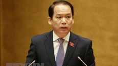 Chủ nhiệm Ủy ban Pháp luật của Quốc hội Hoàng Thanh Tùng trình bày Báo cáo giải trình, tiếp thu, chỉnh lý dự thảo Luật sửa đổi, bổ sung một số điều của Luật Sở hữu trí tuệ. (Ảnh: Phương Hoa/TTXVN)