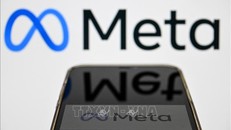 Biểu tượng Meta trên màn hình điện thoại ở Moskva, Nga. Ảnh: AFP/TTXVN