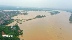 Trung tâm Dự báo khí tượng thủy văn Quốc gia dự báo, trong 12 giờ tới, lũ trên sông Thao tại Yên Bái tiếp tục xuống nhưng vẫn trên mức báo động 3. Ảnh: Tuấn Anh/TTXVN