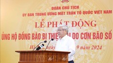 Đồng chí Đỗ Văn Chiến, Ủy viên Bộ Chính trị, Bí thư Trung ương Đảng, Chủ tịch Ủy ban Trung ương MTTQ Việt Nam đọc lời kêu gọi tại Lễ phát động. Ảnh: Phương Hoa/TTXVN