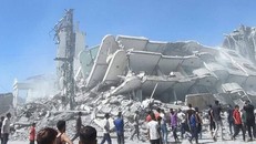 Tòa nhà bị phá hủy sau cuộc không kích của Israel xuống Dải Gaza.