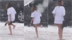 Choáng với thiếu nữ chân trần, không mặc quần đi giữa bão tuyết