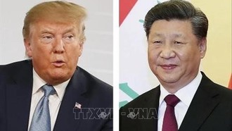 Tổng thống Mỹ Donald Trump (trái) và Chủ tịch Trung Quốc Tập Cận Bình. Ảnh: Kyodo/TTXVN