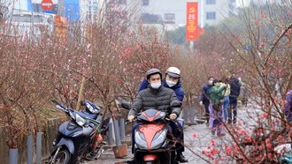 Nhiều chính sách của Đảng và Nhà nước chăm lo người dân đón Tết đầm ấm, an vui. Ảnh: Anh Tuấn/TTXVN.