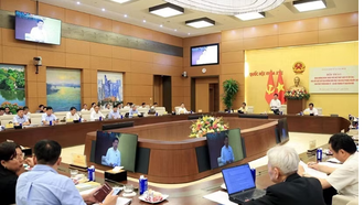 Phó Chủ tịch Quốc hội Nguyễn Hồng Diên chủ trì hội thảo. (Ảnh: Tuấn Anh/TTXVN)