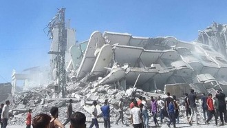 Tòa nhà bị phá hủy sau cuộc không kích của Israel xuống Dải Gaza.