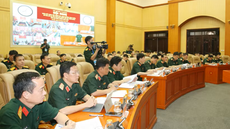 Các đại biểu dự hội nghị tại điểm cầu Bộ Quốc phòng. 