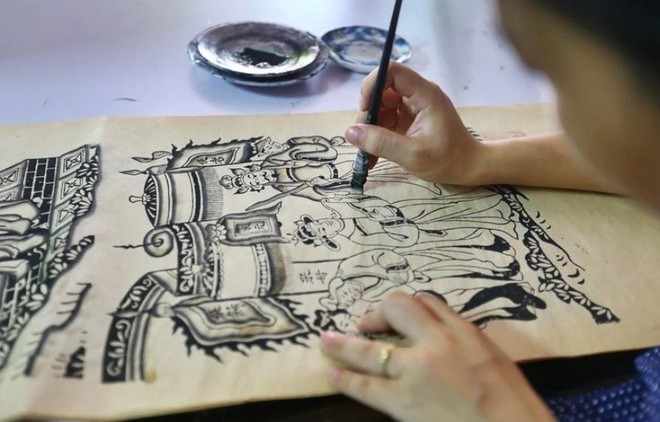 Tranh dân gian Đông Hồ thể hiện sinh động đời sống xã hội nông nghiệp Việt Nam cổ truyền với các phong tục, tập quán sinh hoạt. (Ảnh: TTXVN)