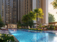 Cụm hồ bơi Aura Flow và bể sục Jacuzzi được quy hoạch giữa thảm xanh nội khu, mang lại không gian thư giãn chuẩn resort.