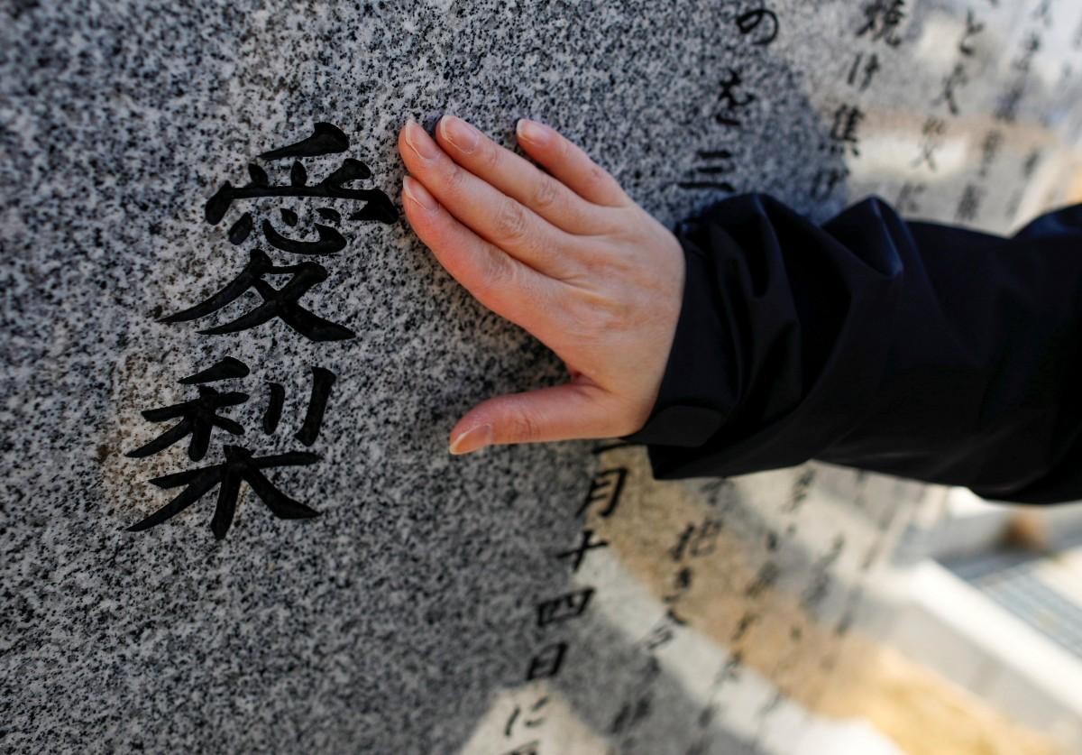 Nỗi buồn khôn nguôi của người sống sót sau thảm họa sóng thần ở Nhật Bản ảnh 5