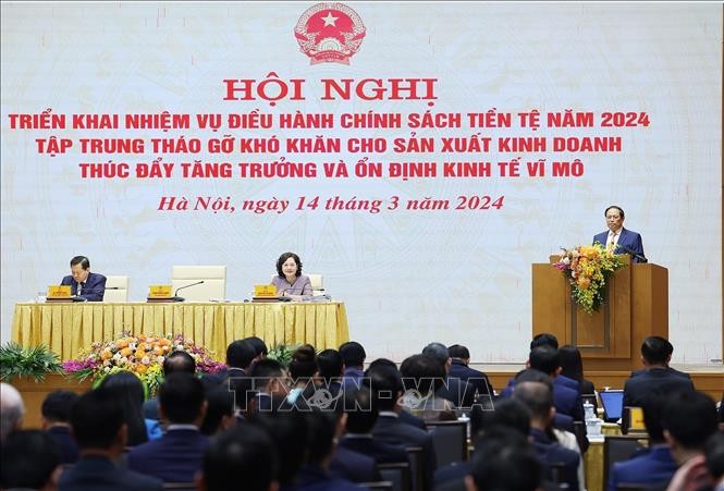 Thủ tướng Phạm Minh Chính chủ trì Hội nghị về điều hành chính sách tiền tệ năm 2024 ảnh 1