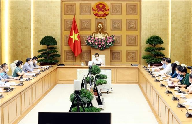 Phó Thủ tướng Vũ Đức Đam chủ trì cuộc họp BCĐ Quốc gia phòng, chống dịch bệnh COVID-19 ảnh 2