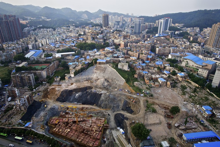 Một thảm kịch giải tỏa đất ở Trung Quốc ảnh 1