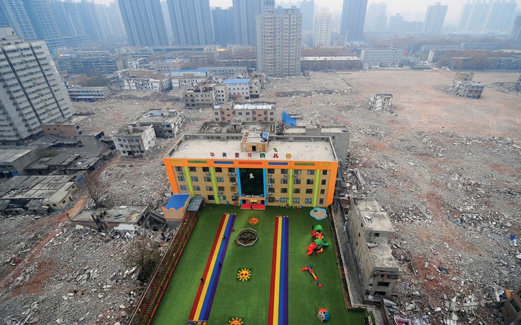 Một thảm kịch giải tỏa đất ở Trung Quốc ảnh 2