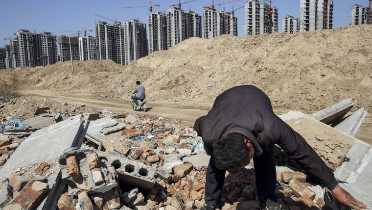 Một thảm kịch giải tỏa đất ở Trung Quốc ảnh 4