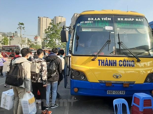 Người dân ùn ùn đổ về bến xe dịp nghỉ Tết Dương lịch 2021 ảnh 4